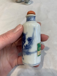 A Chinese famille rose seal paste box and a covered jarlet, a miniature wucai vase and a blue and white snuff bottle, Kangxi mark, 19/20th C.