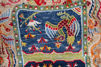 Two Tibetan saddle rugs with dragons and phoenixes, 19th C.