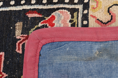 Two Tibetan saddle rugs with dragons and phoenixes, 19th C.