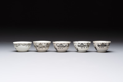Four Chinese gilt-decorated grisaille 'crowned Juno and peacock' cups and saucers and a 'European subject' cup and saucer, Qianlong