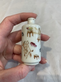 Two Chinese famille rose 'erotic' snuff bottles and a leaf-shaped saucer, 19th C.