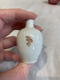 Three Chinese porcelain snuff bottles and a red Peking glass snuff bottle, Daoguang and Tongzhi mark, 19th C.