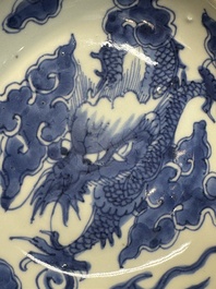 A Chinese blue and white 'dragon' plate and a 'floral' jarlet, Yongzheng mark, 17/18th C.