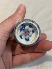 Two Chinese blue, white and copper-red snuff bottles, Yongzheng marks, 19th C.