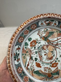 A pair of Chinese famille verte 'phoenixes' plates, Kangxi