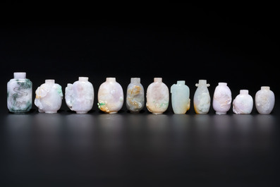 A large collection of 60 Chinese jadeite snuff bottles, 20th C.