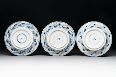 18 Chinese blue and white cups and 16 saucers with floral design, jade mark, Kangxi
