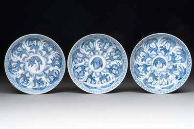 11 Japanese blue and white cups and 12 saucers with floral design, Chenghua mark, Meiji, 19th C.