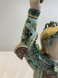 A fine Chinese verte biscuit sculpture of a warrior, 19th C.