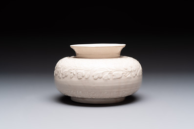 A rare Chinese Dehua blanc de Chine vase with floral design, Kangxi