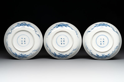 11 Japanese blue and white cups and 12 saucers with floral design, Chenghua mark, Meiji, 19th C.
