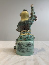 A fine Chinese verte biscuit sculpture of a warrior, 19th C.