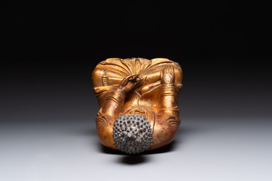A Chinese gilt-lacquered wooden sculpture of Buddha, Ming