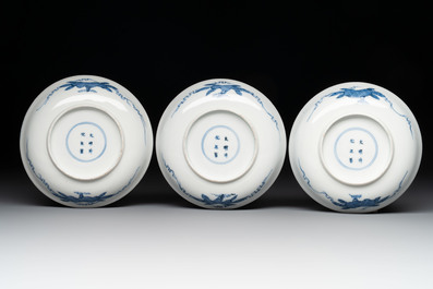 11 Japanese blue and white cups and 12 saucers with floral design, Chenghua mark, Meiji, 19th C.