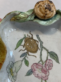 Two Chinese famille rose 'erotic' snuff bottles and a leaf-shaped saucer, 19th C.
