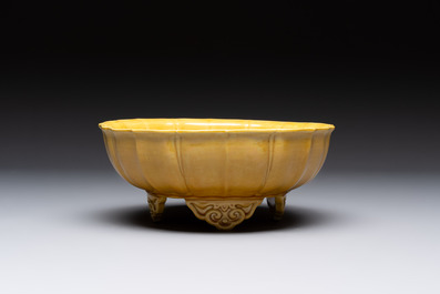 A pair of Chinese yellow-glazed jardini&egrave;res, Yongzheng mark, 20th C.