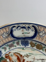 A Japanese Imari 'Parasol Ladies' dish after Cornelis Pronk, Edo, 18th C.