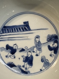 A Chinese blue and white 'klapmuts' bowl with narrative design, Kangxi mark and of the period