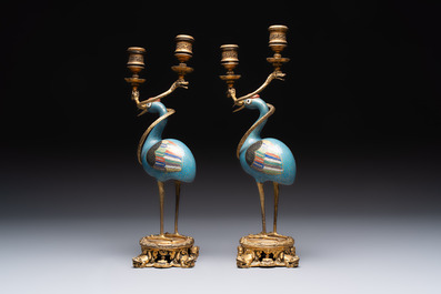 A pair of Chinese cloisonn&eacute; cranes, later mounted as candelabras, 18th C.