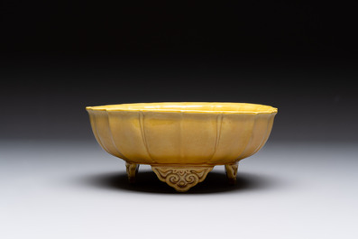 A pair of Chinese yellow-glazed jardini&egrave;res, Yongzheng mark, 20th C.