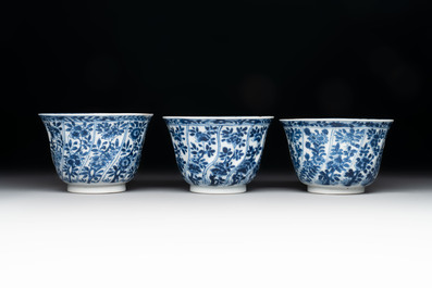 18 Chinese blue and white cups and 16 saucers with floral design, jade mark, Kangxi