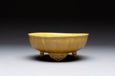 A pair of Chinese yellow-glazed jardini&egrave;res, Yongzheng mark, 20th C.