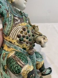 A fine Chinese verte biscuit sculpture of a warrior, 19th C.