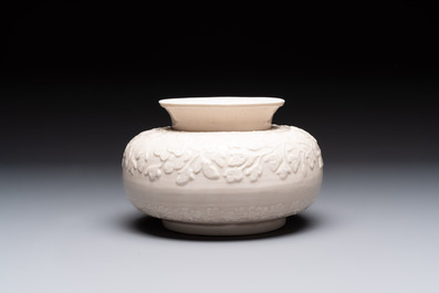 A rare Chinese Dehua blanc de Chine vase with floral design, Kangxi