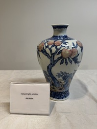 A Chinese blue, white and copper-red 'meiping' vase with 17 peaches, Yongzheng mark, 19/20th C.
