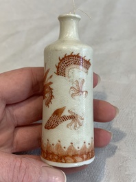 Three Chinese porcelain snuff bottles and a red Peking glass snuff bottle, Daoguang and Tongzhi mark, 19th C.