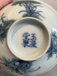 A pair of Chinese doucai bowls with floral design, Yu Qing Tang 玉慶堂製 mark, 19th C.