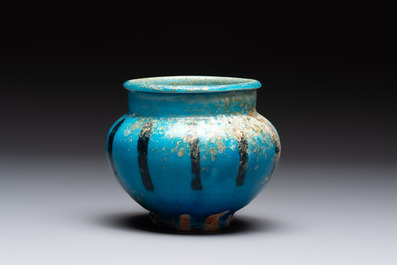 A fine Raqqa turquoise-glazed striped jar, Syria, 13th C.