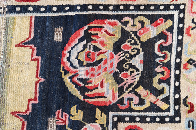 Two Tibetan saddle rugs with dragons and phoenixes, 19th C.