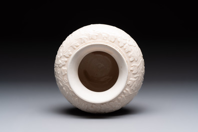 A rare Chinese Dehua blanc de Chine vase with floral design, Kangxi