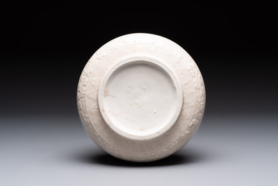 A rare Chinese Dehua blanc de Chine vase with floral design, Kangxi