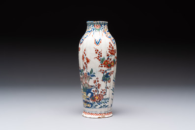 A fine polychrome Dutch Delft cashmere palette ribbed vase with birds among flowering branches, early 18th C.