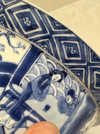 A Chinese blue and white 'klapmuts' bowl with narrative design, Kangxi mark and of the period