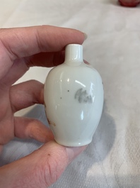 Three Chinese porcelain snuff bottles and a red Peking glass snuff bottle, Daoguang and Tongzhi mark, 19th C.