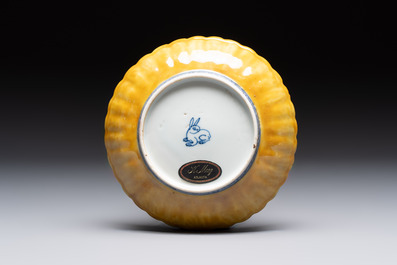 A rare Chinese blue and white yellow-glazed border chrysanthemum-shaped plate with figural design, hare mark, Jiajing