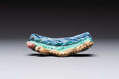 Six Chinese porcelain and glass brush rests, 19/20th C.