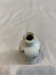 Two Chinese famille rose 'erotic' snuff bottles and a leaf-shaped saucer, 19th C.