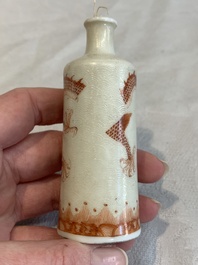 Three Chinese porcelain snuff bottles and a red Peking glass snuff bottle, Daoguang and Tongzhi mark, 19th C.
