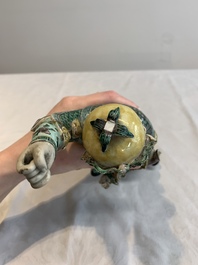 A fine Chinese verte biscuit sculpture of a warrior, 19th C.
