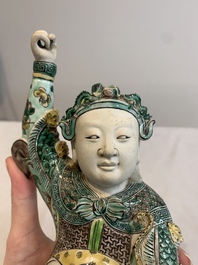 A fine Chinese verte biscuit sculpture of a warrior, 19th C.