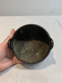 A Chinese bronze tripod censer with wooden cover and stand, Xuande mark, 18/19th C.