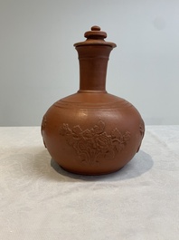 A pair of Yixing-style 'phoenix' bottle vases and covers, possibly England, 18th C.