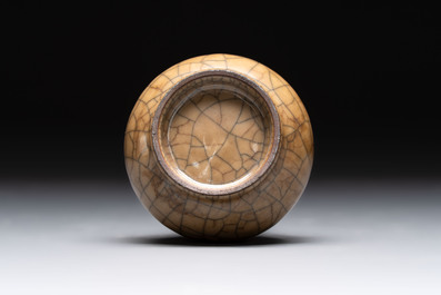 Two Chinese monochrome vases and a water pot on wooden stand, 19/20th C.
