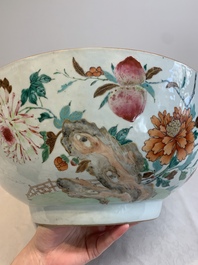 A large Chinese famille rose punch bowl with flowering and fruiting branches, Qianlong