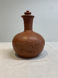 A pair of Yixing-style 'phoenix' bottle vases and covers, possibly England, 18th C.