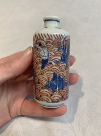 A pair of Chinese blue, white and copper-red 'mythical beasts' and a famille rose 'grasshopper' snuff bottle, Yongzheng and Daoguang mark, 19th C.